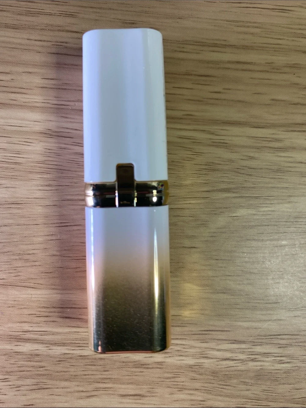L'Oreal Gold Lipstick Tube with Vibrant Fuchsia Label 206